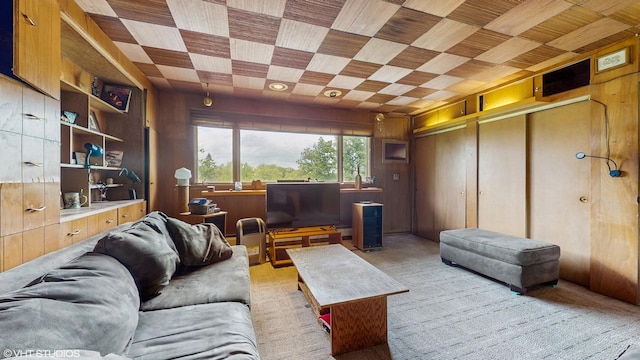 816 Rosedale Ter, Crete, IL 60417 - living area with wood walls and light carpet
