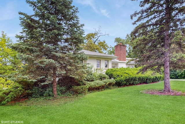816 Rosedale Ter, Crete, IL 60417 - view of green lawn featuring a garage