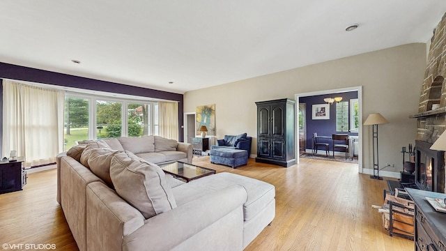 816 Rosedale Ter, Crete, IL 60417 - living area with healthy amount of natural light, light wood finished floors, and a baseboard radiator