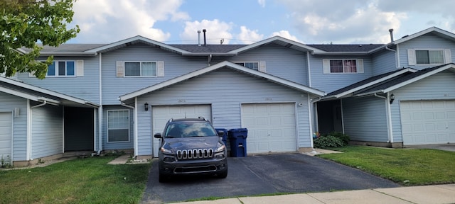 2605 E Martha Pl, Burnham, IL 60633 - townhome / multi-family property featuring driveway and a front yard