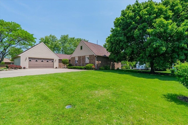 419 Circle Dr, Odell, IL 60460 - view of front of home with a front lawn, concrete driveway, and brick siding