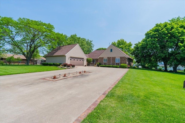 419 Circle Dr, Odell, IL 60460 - view of front facade with a detached garage and a front lawn
