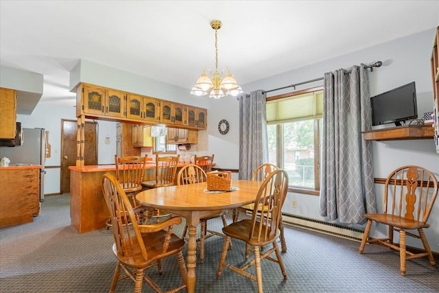 419 Circle Dr, Odell, IL 60460 - dining room featuring carpet and a chandelier