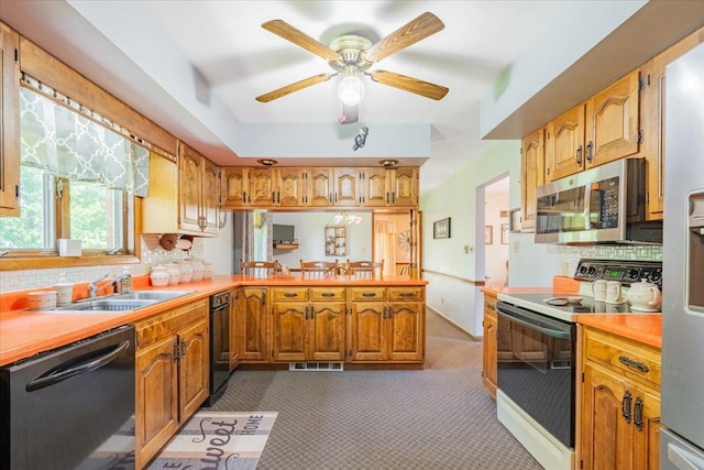 419 Circle Dr, Odell, IL 60460 - kitchen with appliances with stainless steel finishes, a peninsula, light countertops, and backsplash