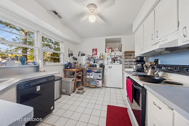 901 E Krage Dr, Addison, IL 60101 - kitchen featuring electric range oven, freestanding refrigerator, black dishwasher, under cabinet range hood, and light tile patterned floors