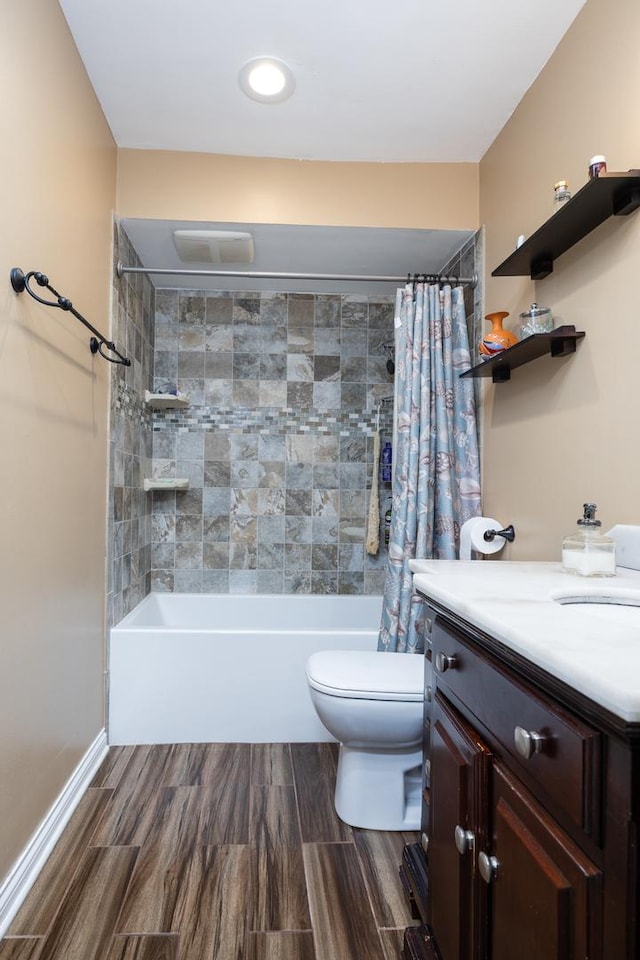 808 E Old Willow Rd Unit 208, Prospect Heights, IL 60070 - bathroom featuring toilet, shower / bath combo with shower curtain, vanity, wood finished floors, and recessed lighting