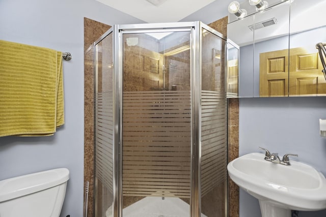 5252 S Drexel Ave Unit 2A, Chicago, IL 60615 - full bathroom with toilet, a stall shower, and a sink