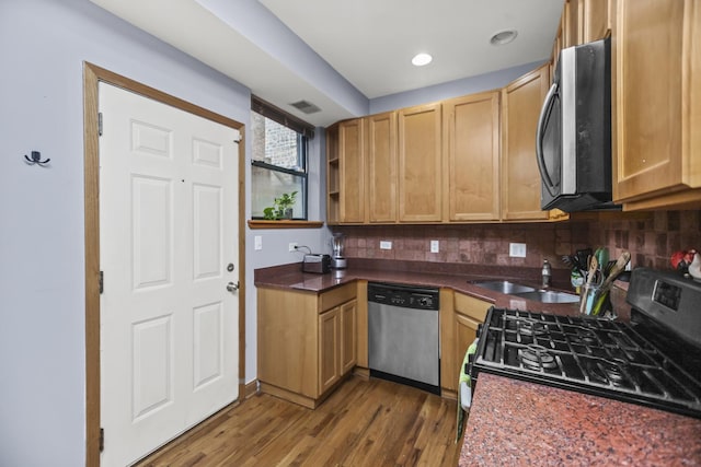 5252 S Drexel Ave Unit 2A, Chicago, IL 60615 - kitchen with stainless steel appliances, a sink, tasteful backsplash, dark wood finished floors, and recessed lighting
