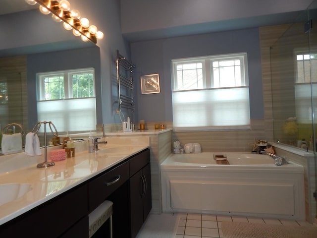 355 Wentworth Ln, Bartlett, IL 60103 - full bath featuring a bath, plenty of natural light, tile patterned flooring, and double vanity