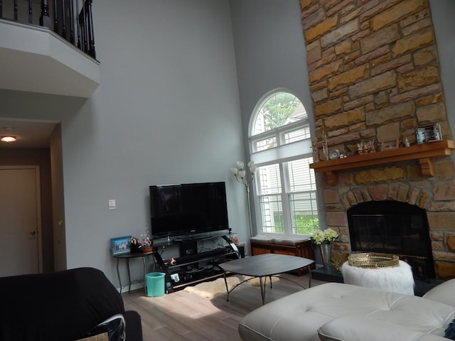 355 Wentworth Ln, Bartlett, IL 60103 - living room featuring a high ceiling, wood finished floors, and a fireplace