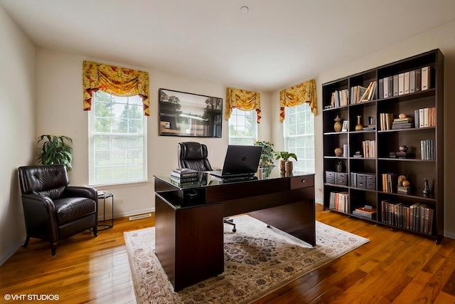 5436 Swan Cir, Hoffman Estates, IL 60192 - home office with plenty of natural light and wood finished floors