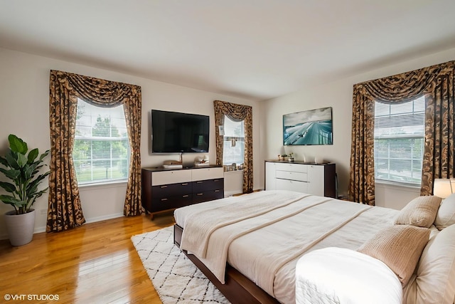 5436 Swan Cir, Hoffman Estates, IL 60192 - bedroom featuring light wood-type flooring and baseboards