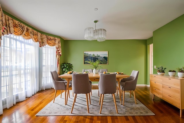 5436 Swan Cir, Hoffman Estates, IL 60192 - dining area featuring a chandelier and wood finished floors
