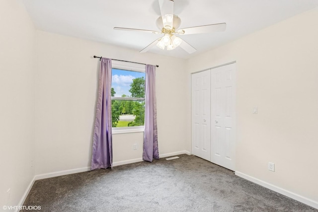 11 Willow Ct, Spring Valley, IL 61362 - unfurnished bedroom featuring carpet floors, a closet, baseboards, and ceiling fan