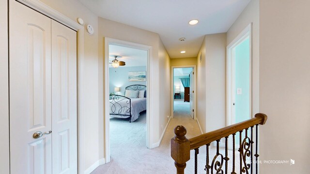 2515 Thurston Ct, Aurora, IL 60502 - hallway featuring light colored carpet, recessed lighting, and an upstairs landing