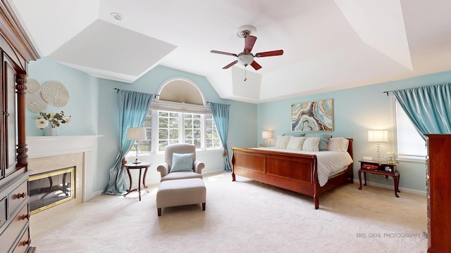2515 Thurston Ct, Aurora, IL 60502 - bedroom featuring light carpet, lofted ceiling, a premium fireplace, and ceiling fan