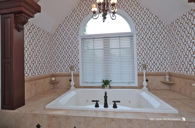 2515 Thurston Ct, Aurora, IL 60502 - full bath with a whirlpool tub, a chandelier, and vaulted ceiling