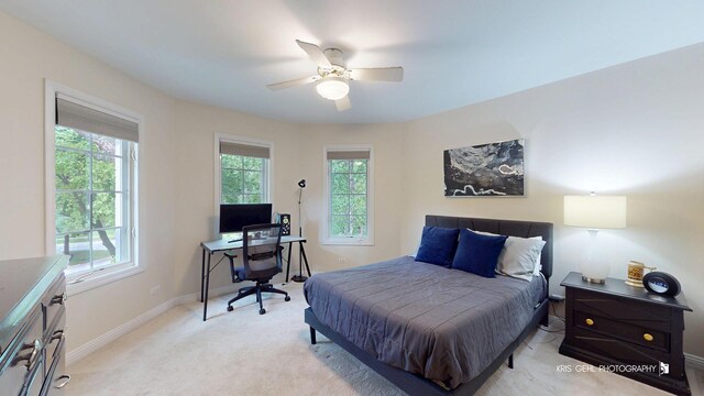 2515 Thurston Ct, Aurora, IL 60502 - bedroom featuring multiple windows, light colored carpet, a desk, and a ceiling fan
