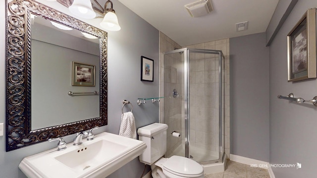 2515 Thurston Ct, Aurora, IL 60502 - full bathroom featuring a shower stall and tile patterned flooring
