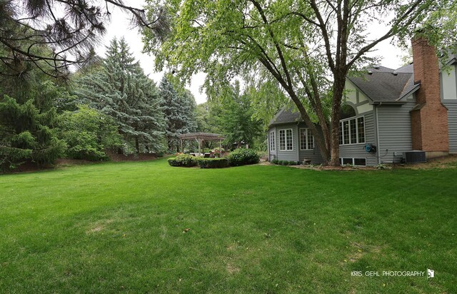 2515 Thurston Ct, Aurora, IL 60502 - view of green lawn with a pergola