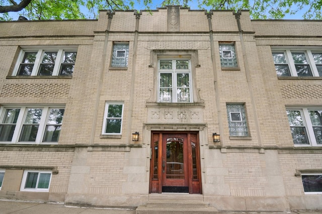 5055 N California Ave Unit 1S, Chicago, IL 60625 - property entrance featuring brick siding