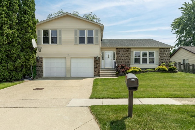 31 W Devon Ave, Glendale Heights, IL 60139 - split level home featuring brick siding, driveway, and an attached garage