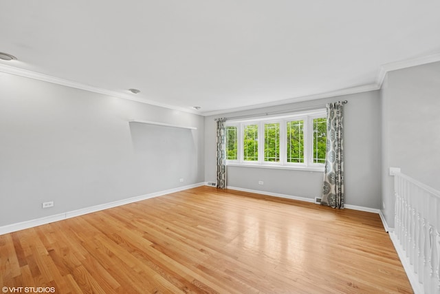 102 S Grant Dr, Addison, IL 60101 - unfurnished room with ornamental molding and light wood-style floors