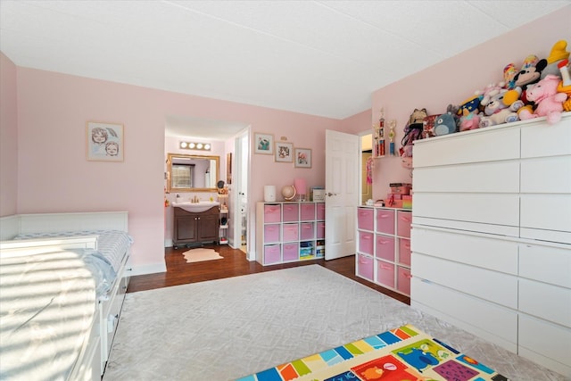 47 Pier Dr Unit 102, Westmont, IL 60559 - bedroom featuring wood finished floors and a sink
