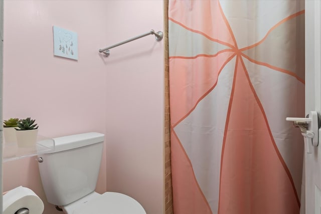 47 Pier Dr Unit 102, Westmont, IL 60559 - bathroom with toilet and curtained shower