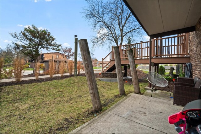 47 Pier Dr Unit 102, Westmont, IL 60559 - view of green lawn with stairway, a patio, and a wooden deck