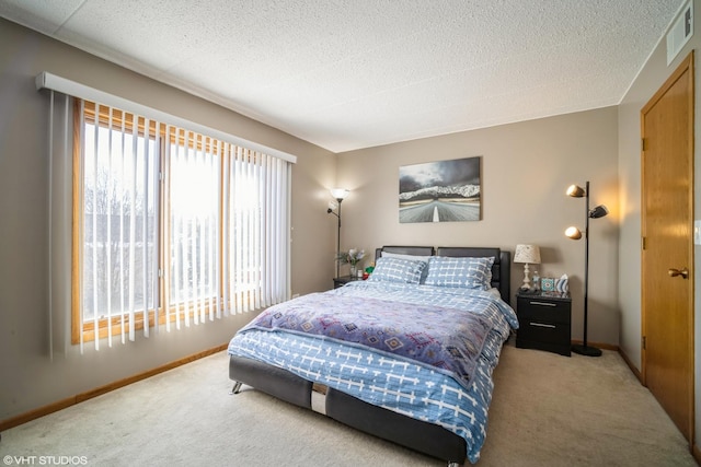 1380 Oakwood Ave Unit 306, Des Plaines, IL 60016 - carpeted bedroom with a textured ceiling and baseboards