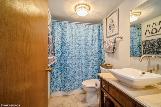 1380 Oakwood Ave Unit 306, Des Plaines, IL 60016 - bathroom featuring toilet, tile patterned floors, vanity, and curtained shower