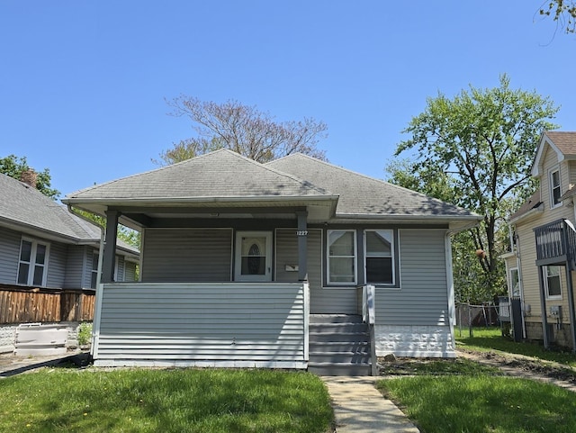 1227 Emerald Ave, Chicago Heights, IL 60411 - bungalow-style home featuring a shingled roof and a porch