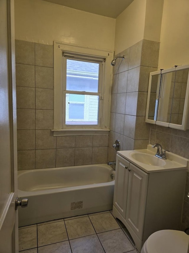 1227 Emerald Ave, Chicago Heights, IL 60411 - full bath with vanity, tile patterned flooring, toilet, and washtub / shower combination