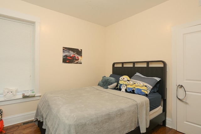 401 N Humphrey Ave, Oak Park, IL 60302 - bedroom with dark wood finished floors and baseboards