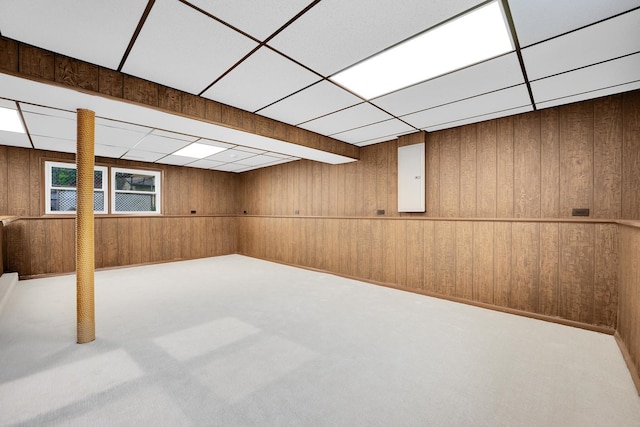 18624 W Pamela Pl, Gurnee, IL 60031 - basement featuring wooden walls, carpet floors, a drop ceiling, and electric panel