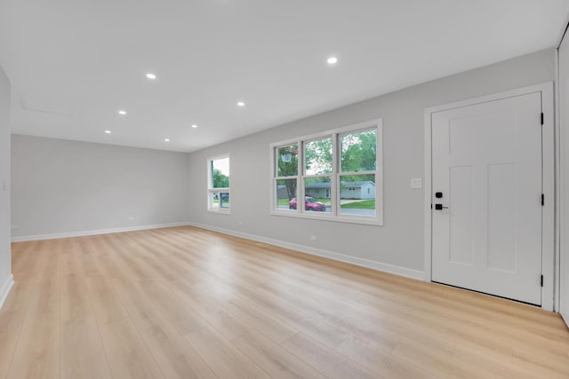 18624 W Pamela Pl, Gurnee, IL 60031 - unfurnished living room with light wood-style floors and recessed lighting