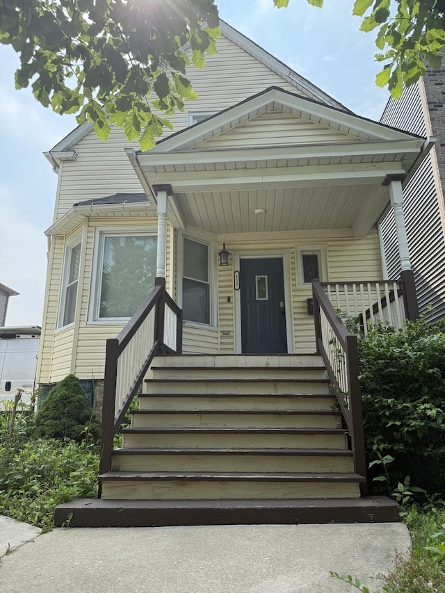 112 S Waller Ave, Chicago, IL 60644 - view of front facade with stairway and covered porch