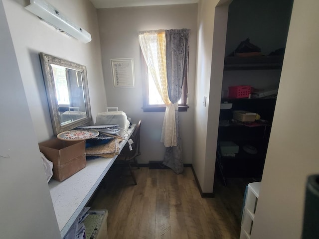 42W490 Kedeka Rd, Sugar Grove, IL 60554 - laundry area with an AC wall unit, wood finished floors, and a desk