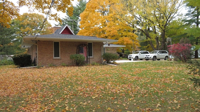 42W490 Kedeka Rd, Sugar Grove, IL 60554 - view of front facade with brick siding and a front yard