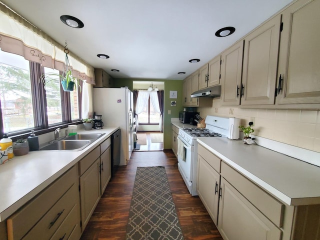42W490 Kedeka Rd, Sugar Grove, IL 60554 - kitchen featuring white appliances, under cabinet range hood, healthy amount of natural light, dark wood-type flooring, and recessed lighting