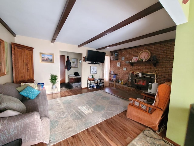 42W490 Kedeka Rd, Sugar Grove, IL 60554 - living room featuring a wood stove, wood finished floors, and beam ceiling