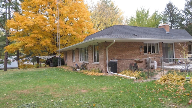 42W490 Kedeka Rd, Sugar Grove, IL 60554 - view of property exterior with brick siding, a chimney, a shingled roof, and a gate