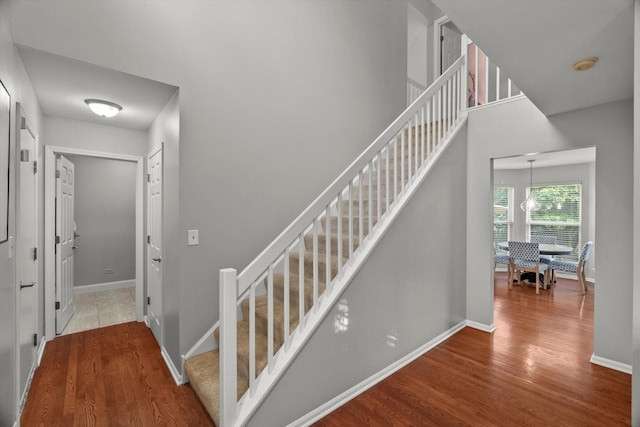 2003 Schumacher Dr, Naperville, IL 60540 - stairs featuring wood finished floors and baseboards