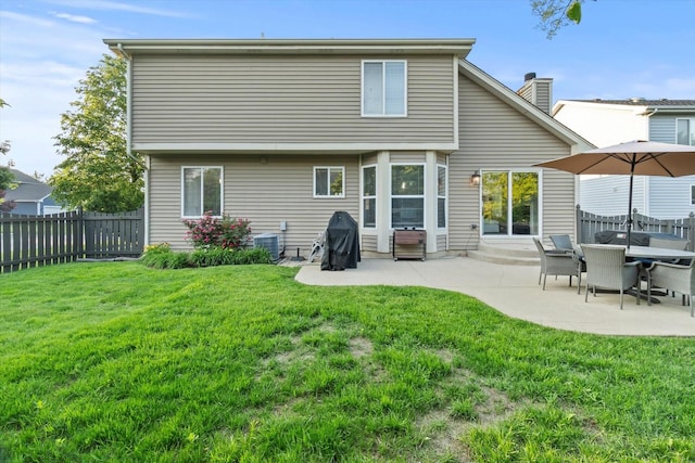 2003 Schumacher Dr, Naperville, IL 60540 - back of house featuring a patio and a fenced backyard