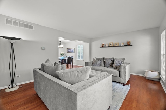 2003 Schumacher Dr, Naperville, IL 60540 - living room featuring wood finished floors and a chandelier