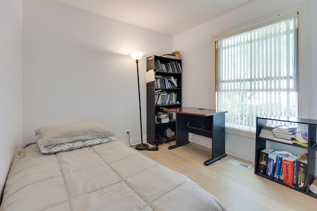 91 Rockledge Dr, Romeoville, IL 60446 - bedroom featuring wood finished floors and baseboards