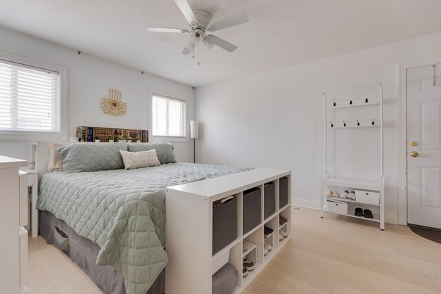 91 Rockledge Dr, Romeoville, IL 60446 - bedroom with light wood-style flooring and ceiling fan