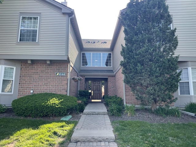 1744 Eastwood Ct Unit 3, Schaumburg, IL 60195 - view of exterior entry featuring brick siding