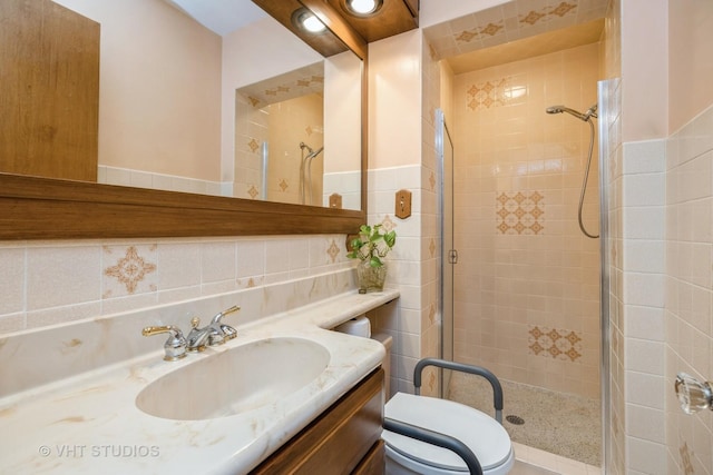 1707 N 78th Ave, Elmwood Park, IL 60707 - full bathroom featuring a stall shower, vanity, and tile walls